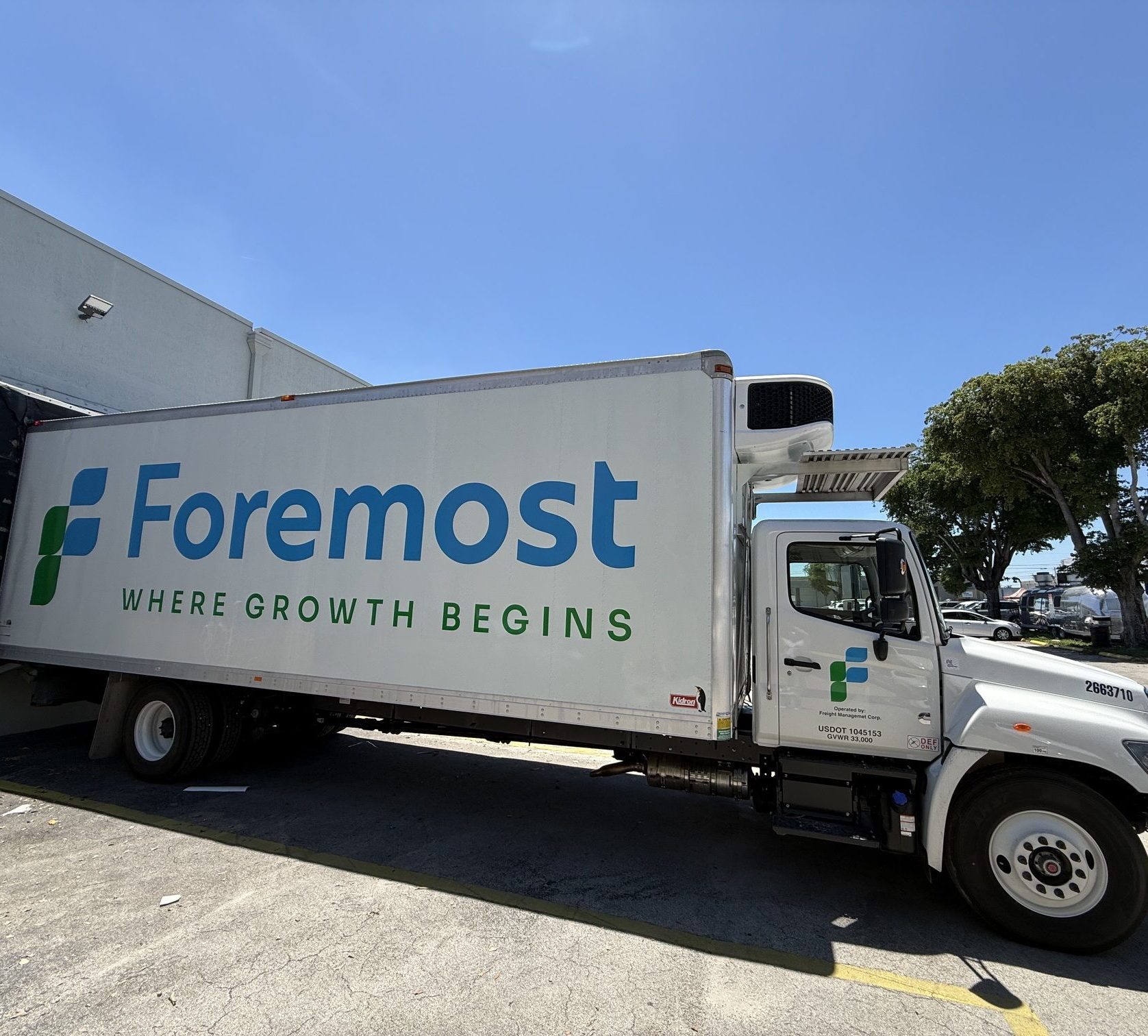 ForemostCo delivery truck at a loading bay, providing climate-controlled transport of wholesale starter plants to commercial growers